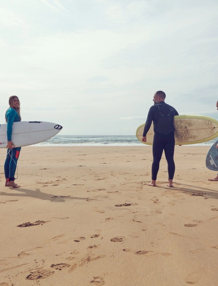 Surfers on West Wales beach