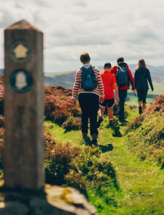 Walkers at Moel Fenlli, Offa's Dyke Path, Denbighshire, North Wales
