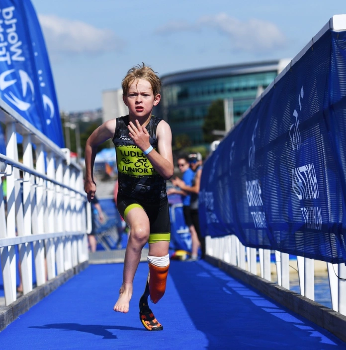 Boy taking part in Go Tri Aquathlon, Swansea, West Wales