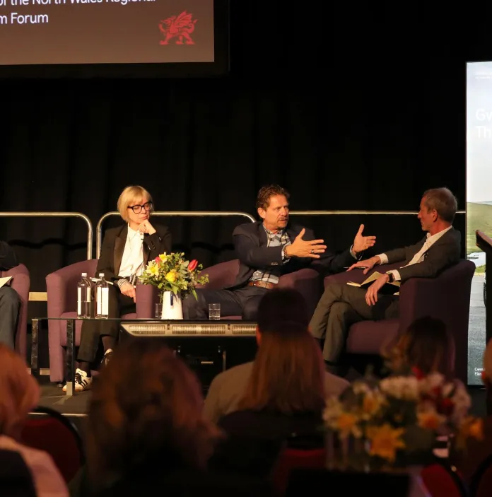 Panel members discussing at the Wales Tourism Summit 2025, Venue Cymru, Llandudno.