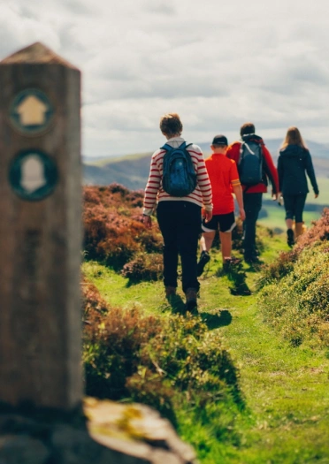 Walkers at Moel Fenlli, Offa's Dyke Path, Denbighshire, North Wales