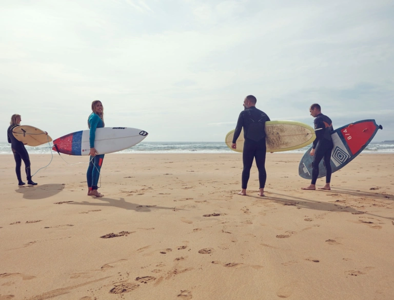 Surfers on West Wales beach