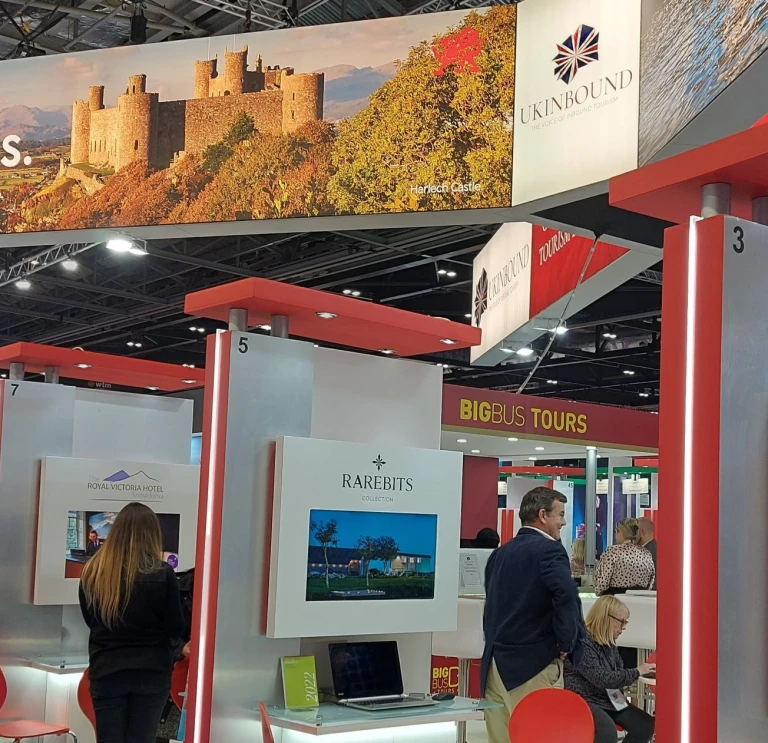 Wales stands at a travel trade show.