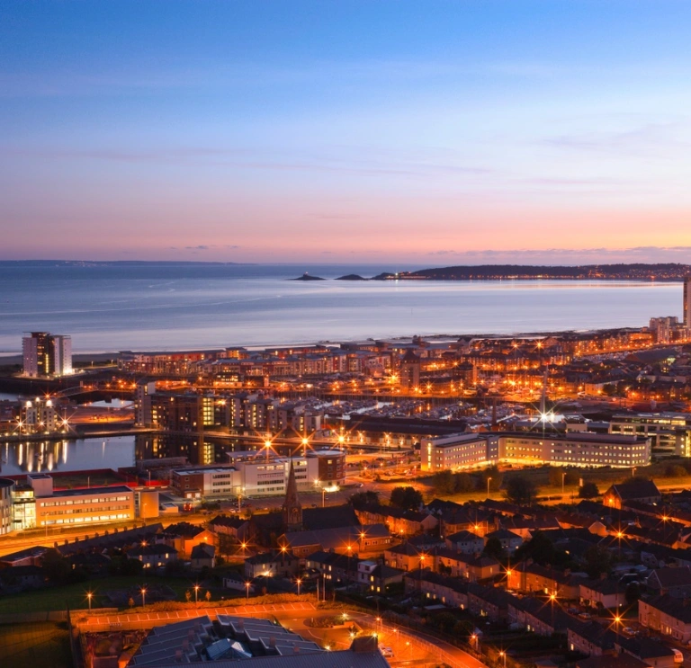 View over Swansea town at early evening toward Mumbles Head Swansea South Towns and Villages