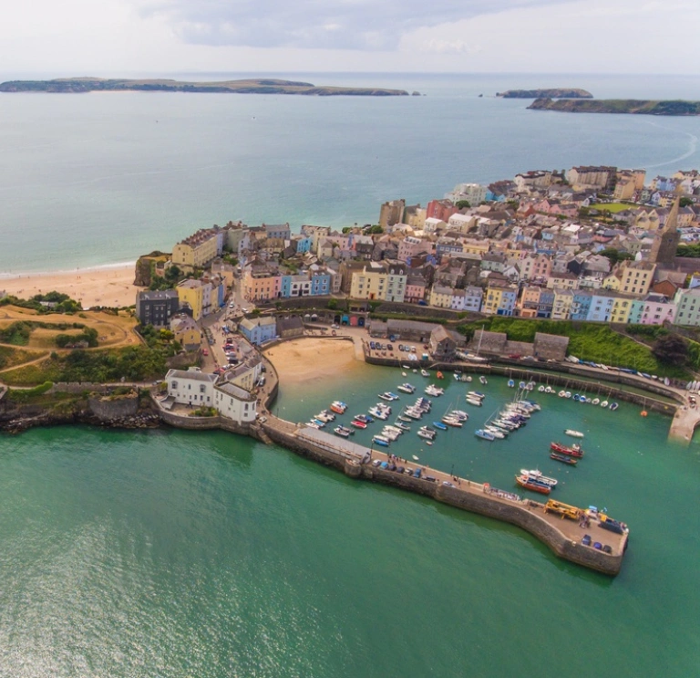 Looking down on Tenby onto the harbour, castle and beach