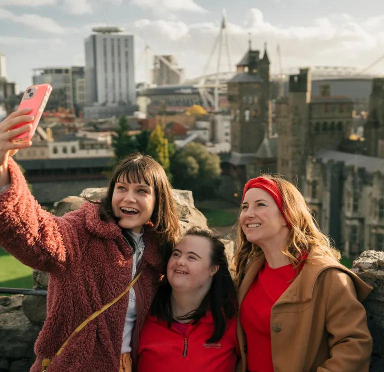 Image of three people taking a selfie at Cardiff Castle