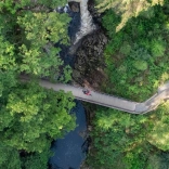 Aerial image of Coed y Brenin, cyclist on bridge
