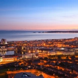 View over Swansea town at early evening toward Mumbles Head Swansea South Towns and Villages