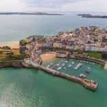 Looking down on Tenby onto the harbour, castle and beach