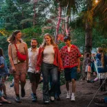 A group of young people at the Between the Trees festival, Candleston Woods, Merthyr Mawr, South Wales.