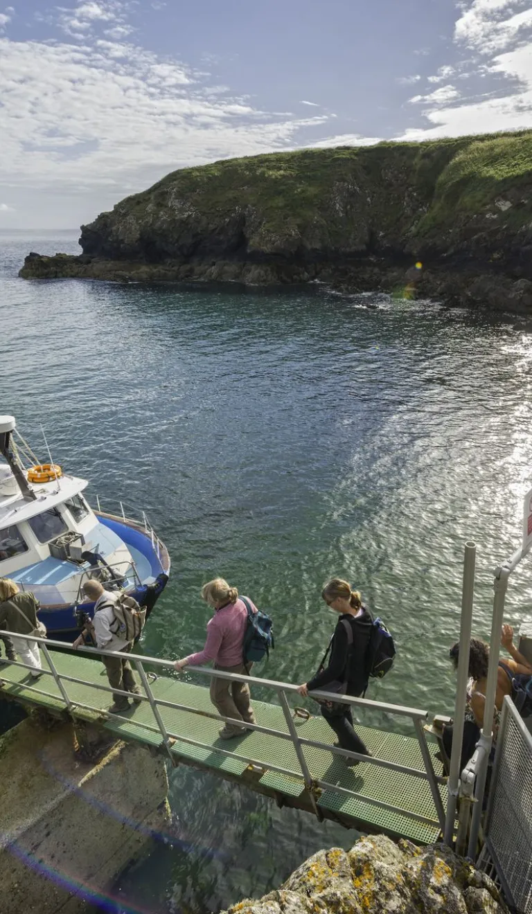 Group boarding Dale Princess boat at Martin's Haven, Skomer, Pembrokeshire.