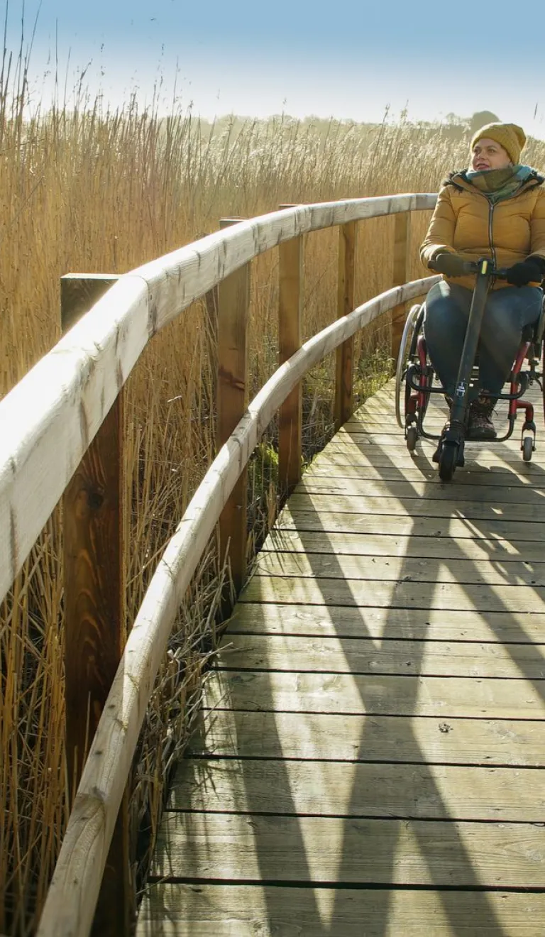Kristina Jackson, wheelchair user, using the easy access path at Cilgerran Wildlife Reserve